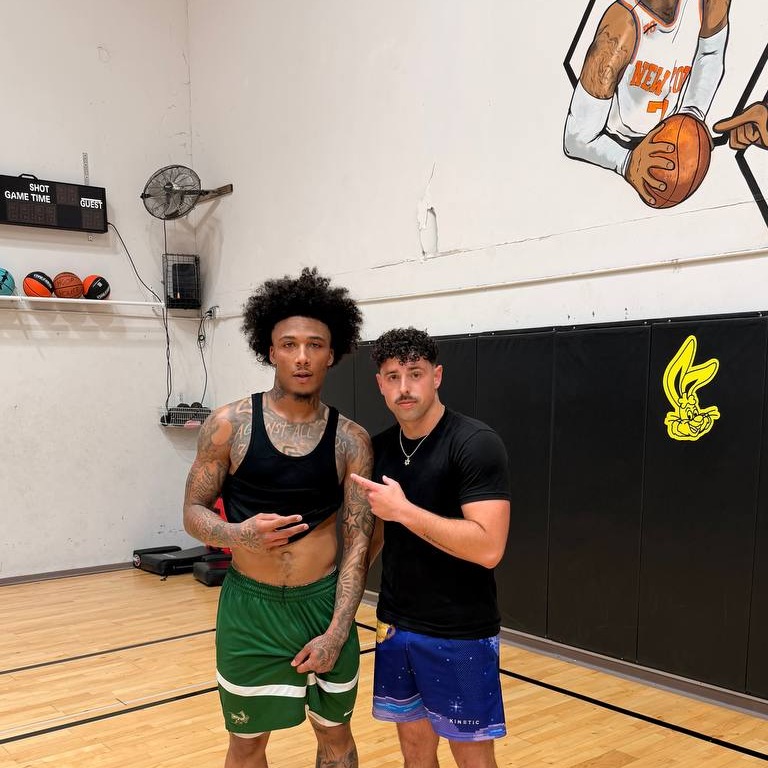 Coach Ran Hadas with an athlete